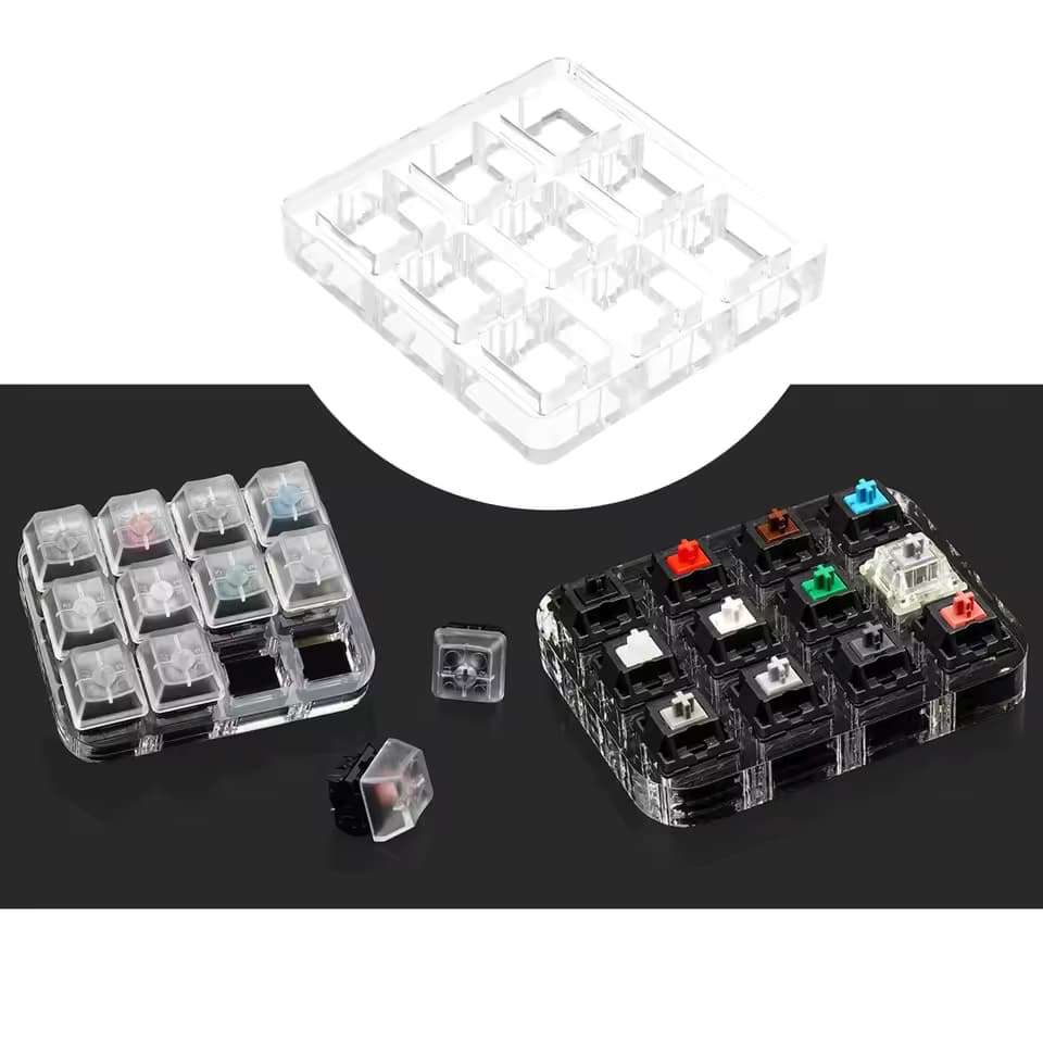 A picture of a 3x3 switch tester with switches inserted and blank keycaps